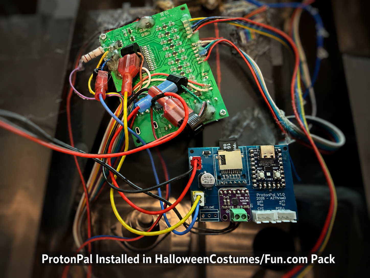 ProtonPal V1.0 installed alongside the factory electronics in a HalloweenCostumes and Fun.com proton pack